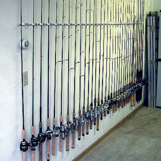 Wall mounted Trac-A-Rod fishing rod rack storage system in garage