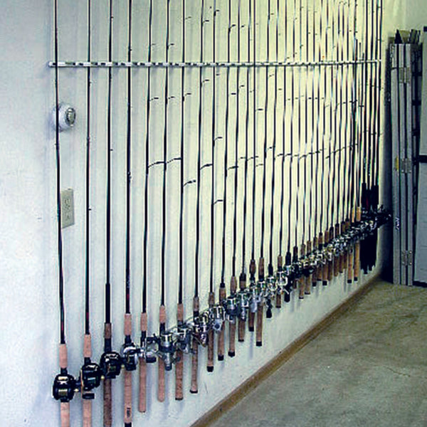 Wall mounted Trac-A-Rod fishing rod rack storage system in garage