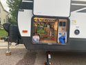 Dubro fishing rod rack mounted in rv camper storage
